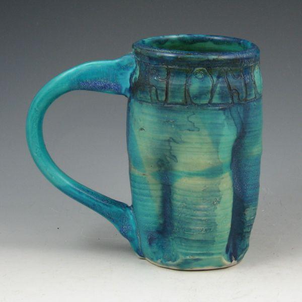 Appraisal: Studio pottery mug hand thrown and incised with brightly colored