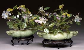 Appraisal: PAIR JADE VESSELS WITH FLOWERING TREES Pair very elaborately carved