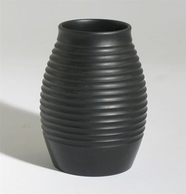 Appraisal: A Wedgwood black basalt vase by Keith Murray ribbed swollen