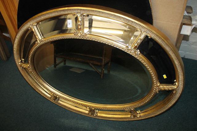 Appraisal: A PAIR OF GEORGIAN STYLE GILT OVAL WALL MIRRORS each