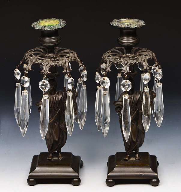 Appraisal: A PAIR OF TH CENTURY BRONZE LUSTRE CANDLESTICKS of classical