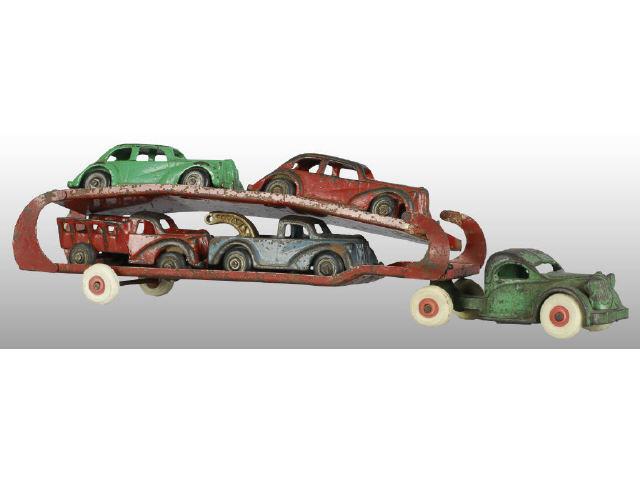 Appraisal: Cast Iron Arcade Car Carrier with Vehicle Load Description Green