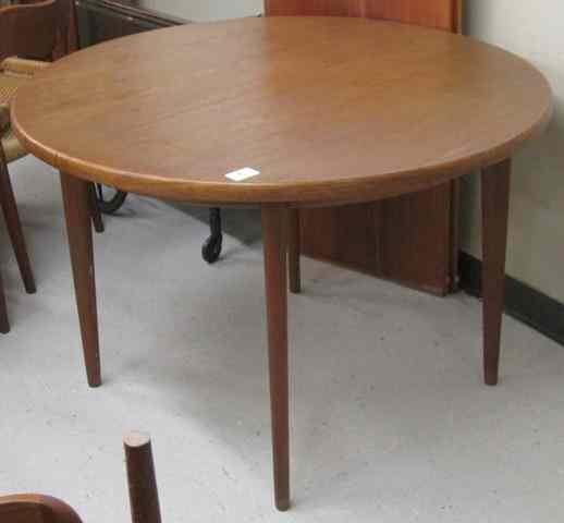 Appraisal: ROUND DANISH MODERN TEAK DINING TABLE WITH TWO LEAVES J