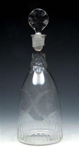 Appraisal: A LATE TH CENTURY TAPERED GLASS DECANTER engraved with vesicas