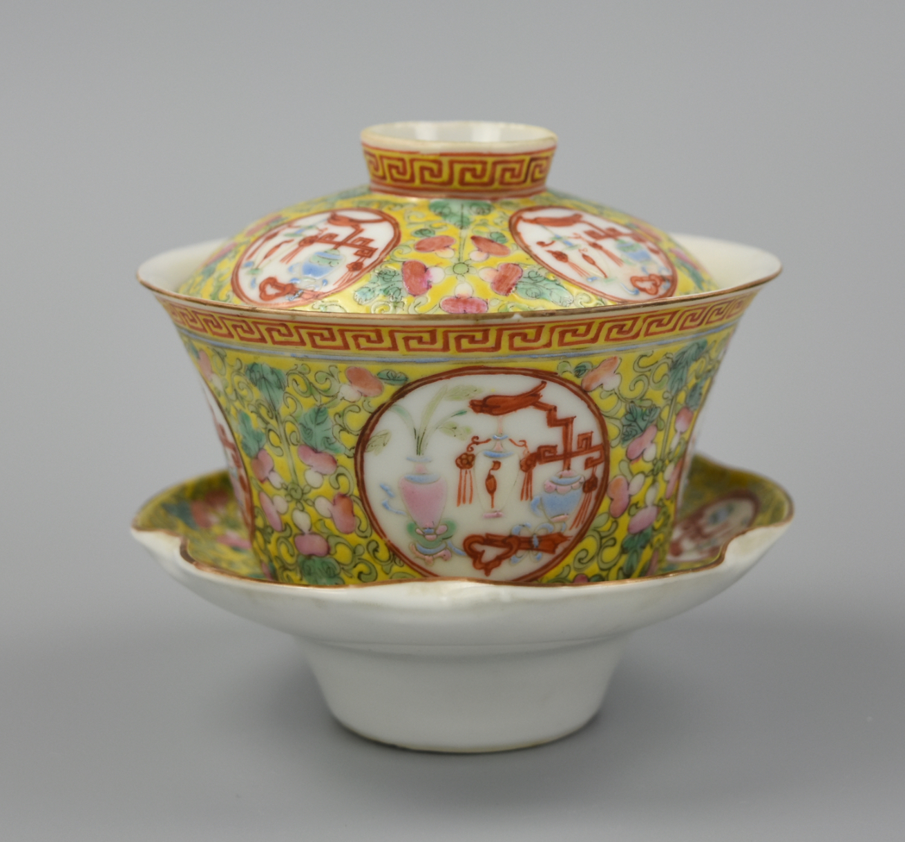 Appraisal: CHINESE FAMILLE ROSE YELLOW TEACUP SET TH C A Chinese