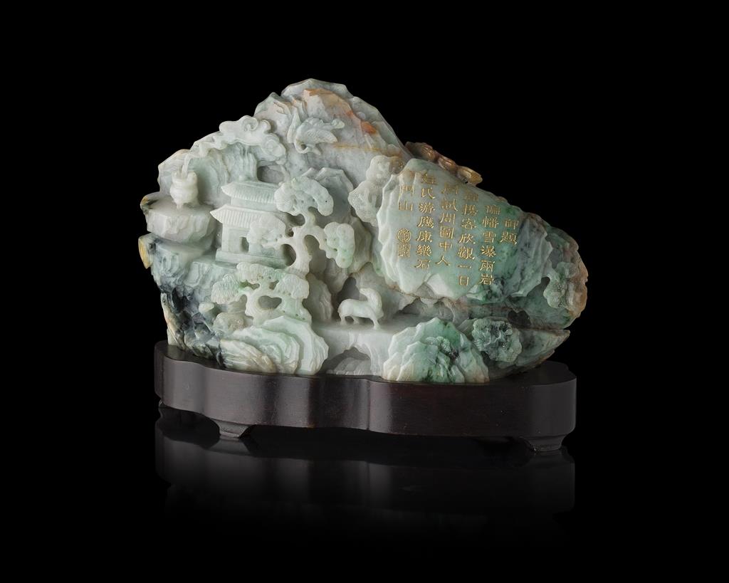 Appraisal: CARVED JADEITE BOULDER with russet and spinach green highlights carved