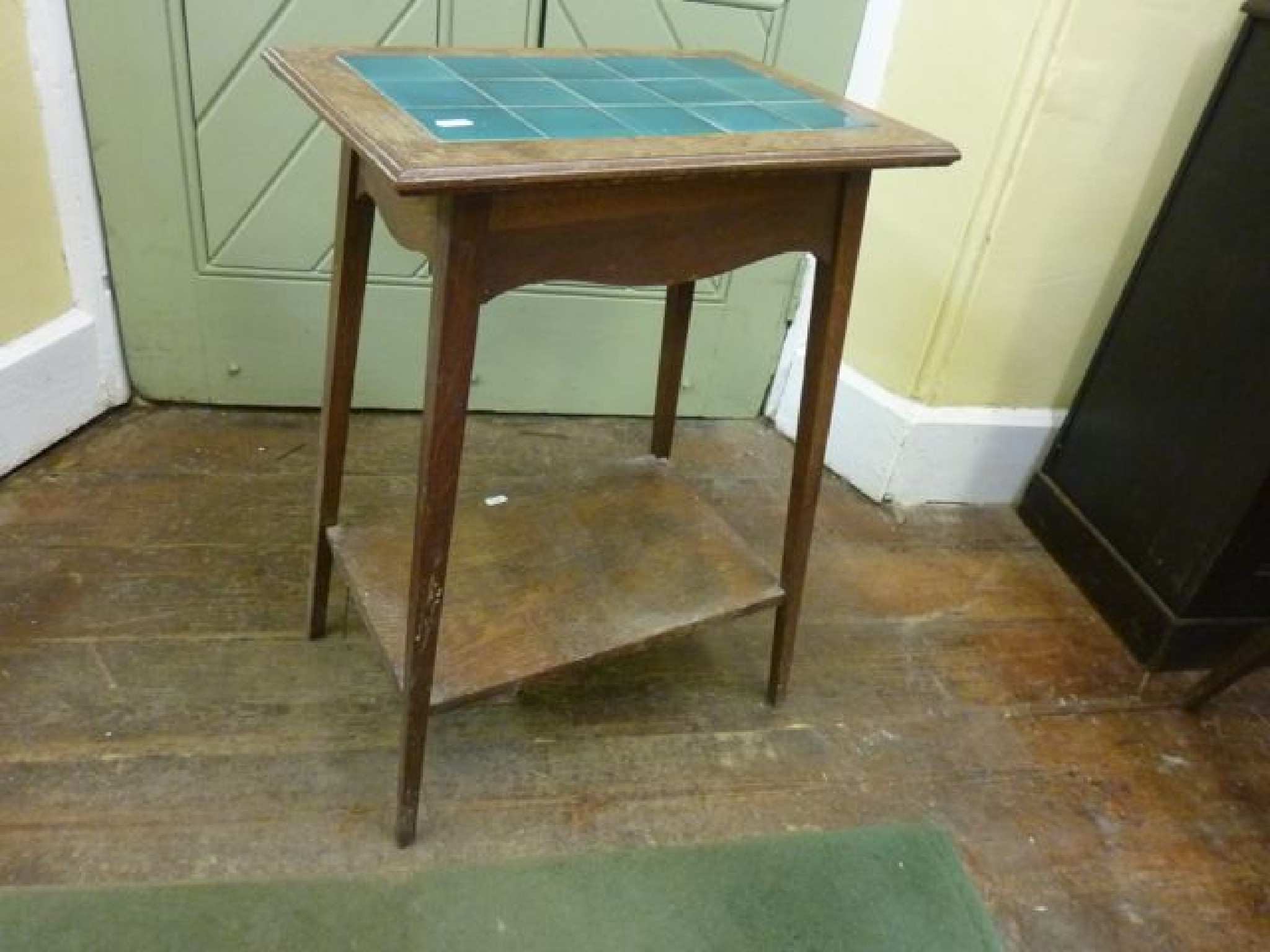 Appraisal: A Georgian oak hanging corner cupboard the single door with