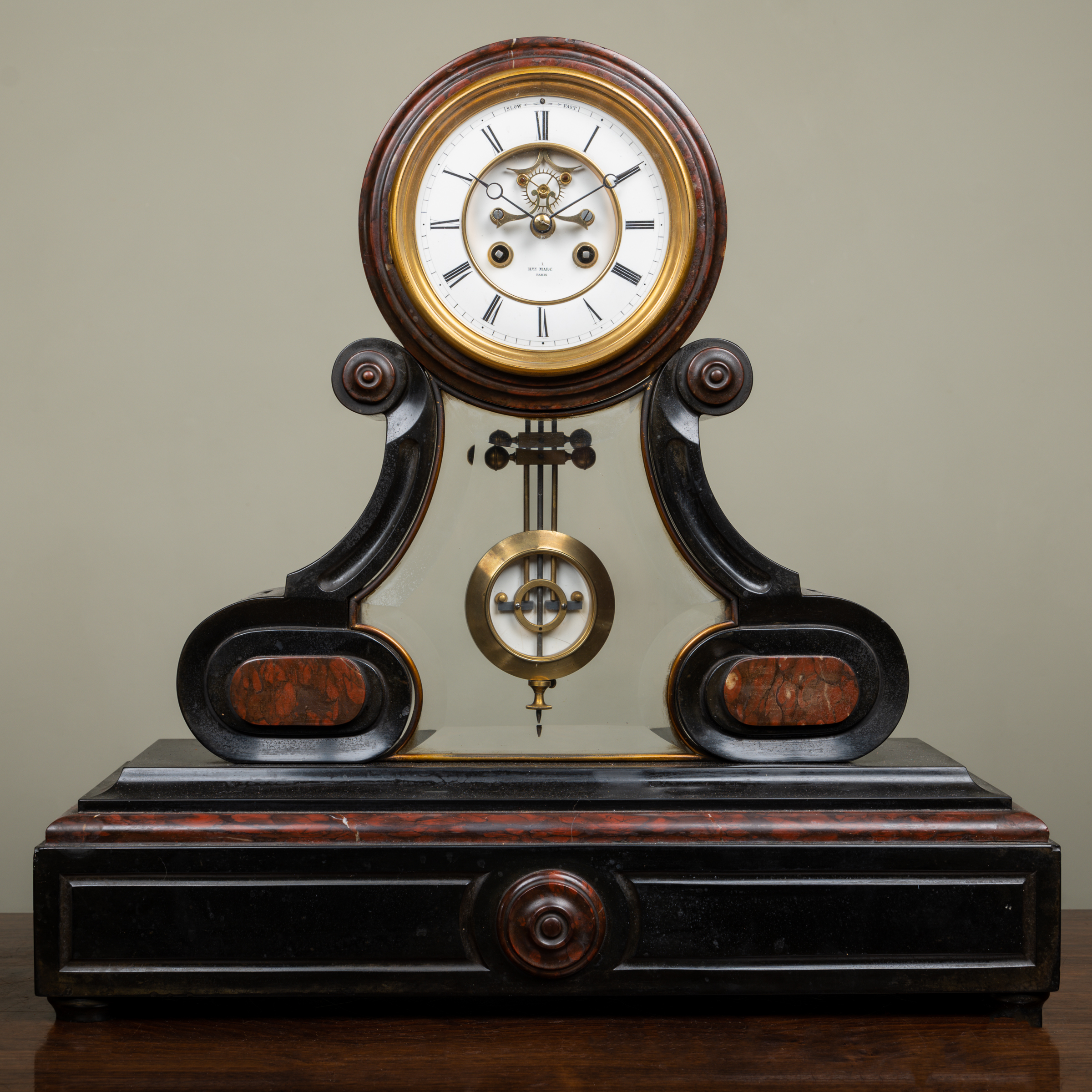 Appraisal: A th Century French polished slate and marble mantle clock