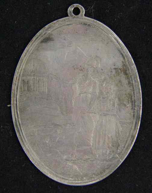 Appraisal: An oval medallion etched two figures the reverse inscribed 'A