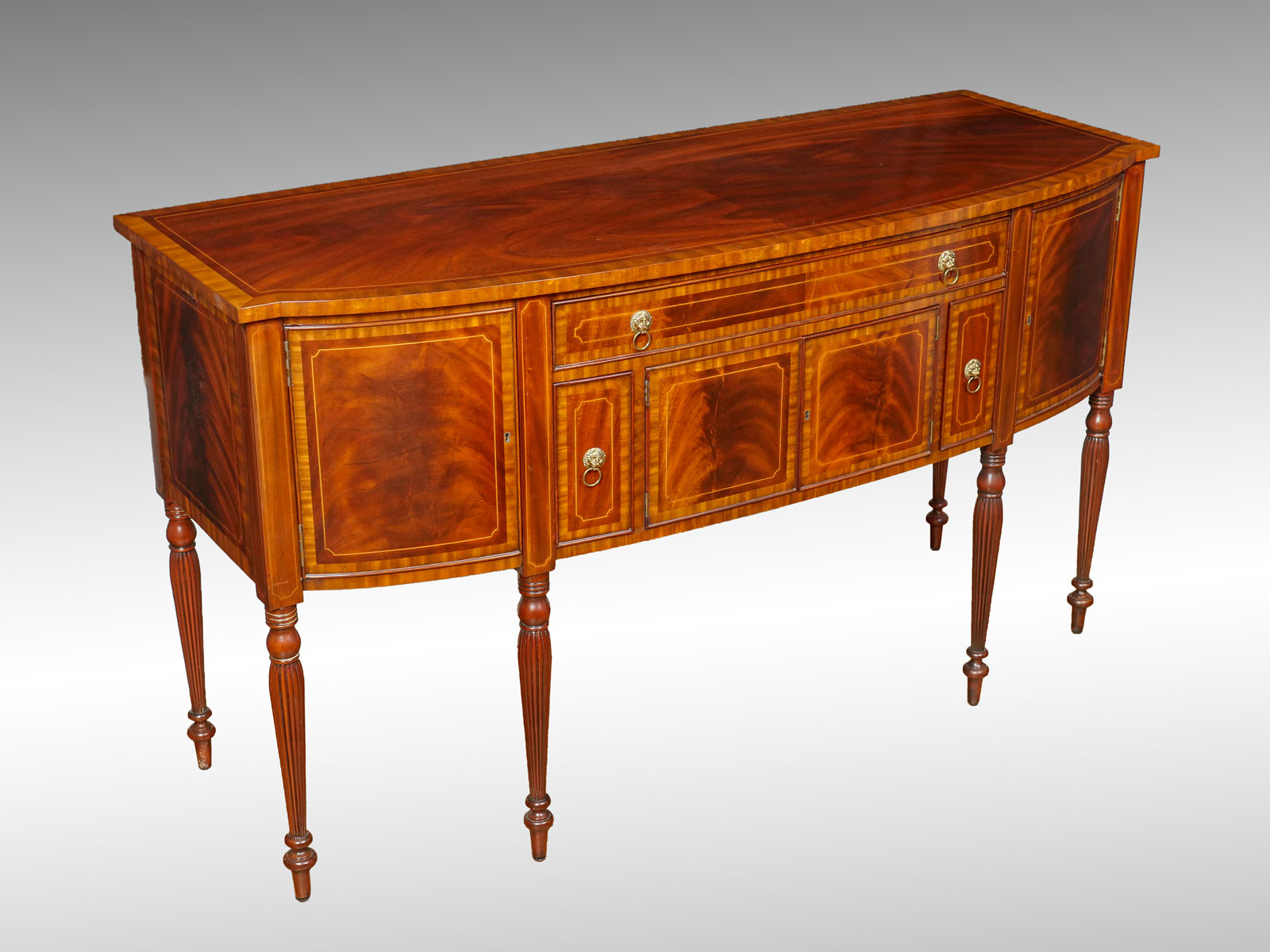 Appraisal: MAITLAND SMITH SHERATON STYLE SIDEBOARD A Sheraton style mahogany sideboard