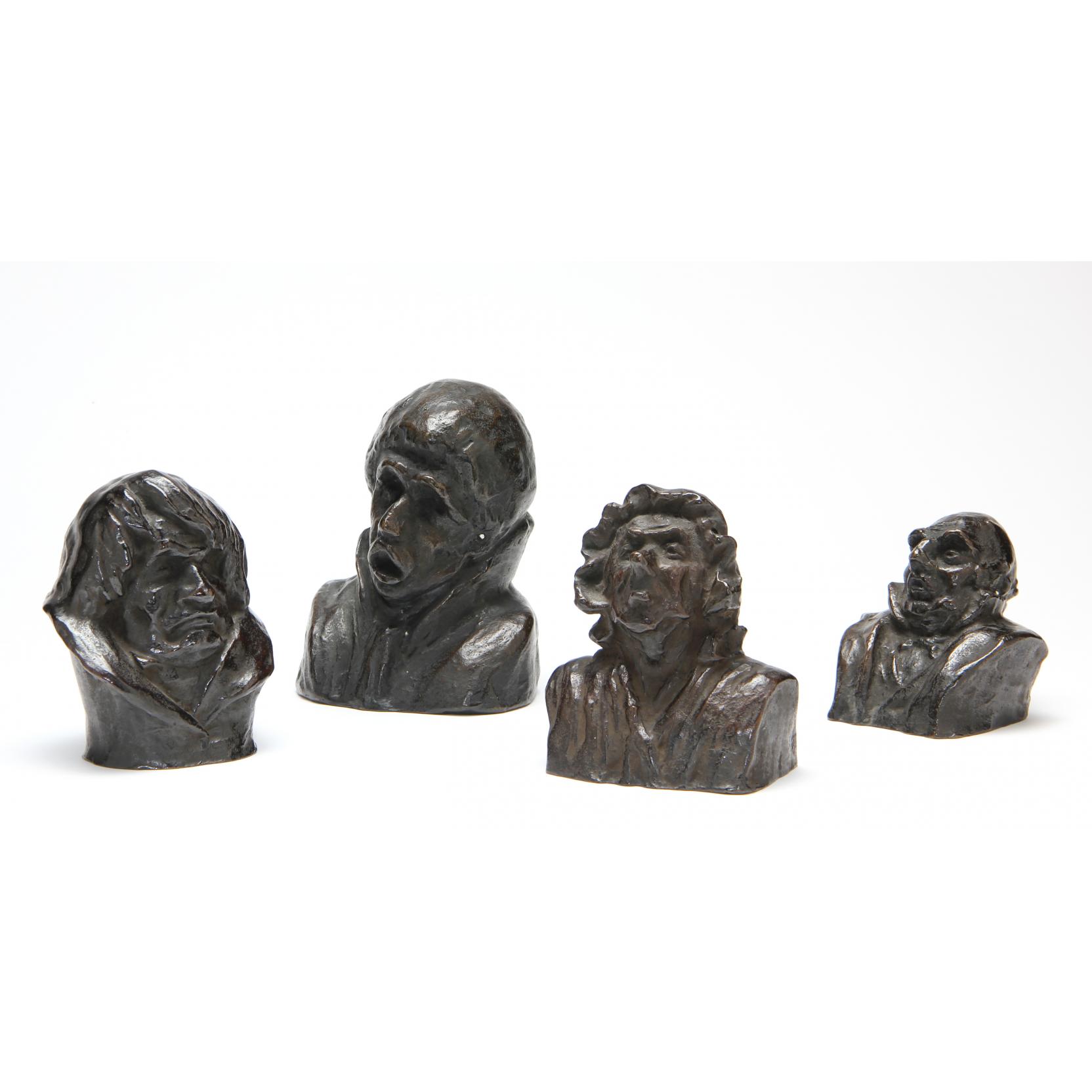 Appraisal: after Honor Daumier Four Bronze Busts all signed H Daumier