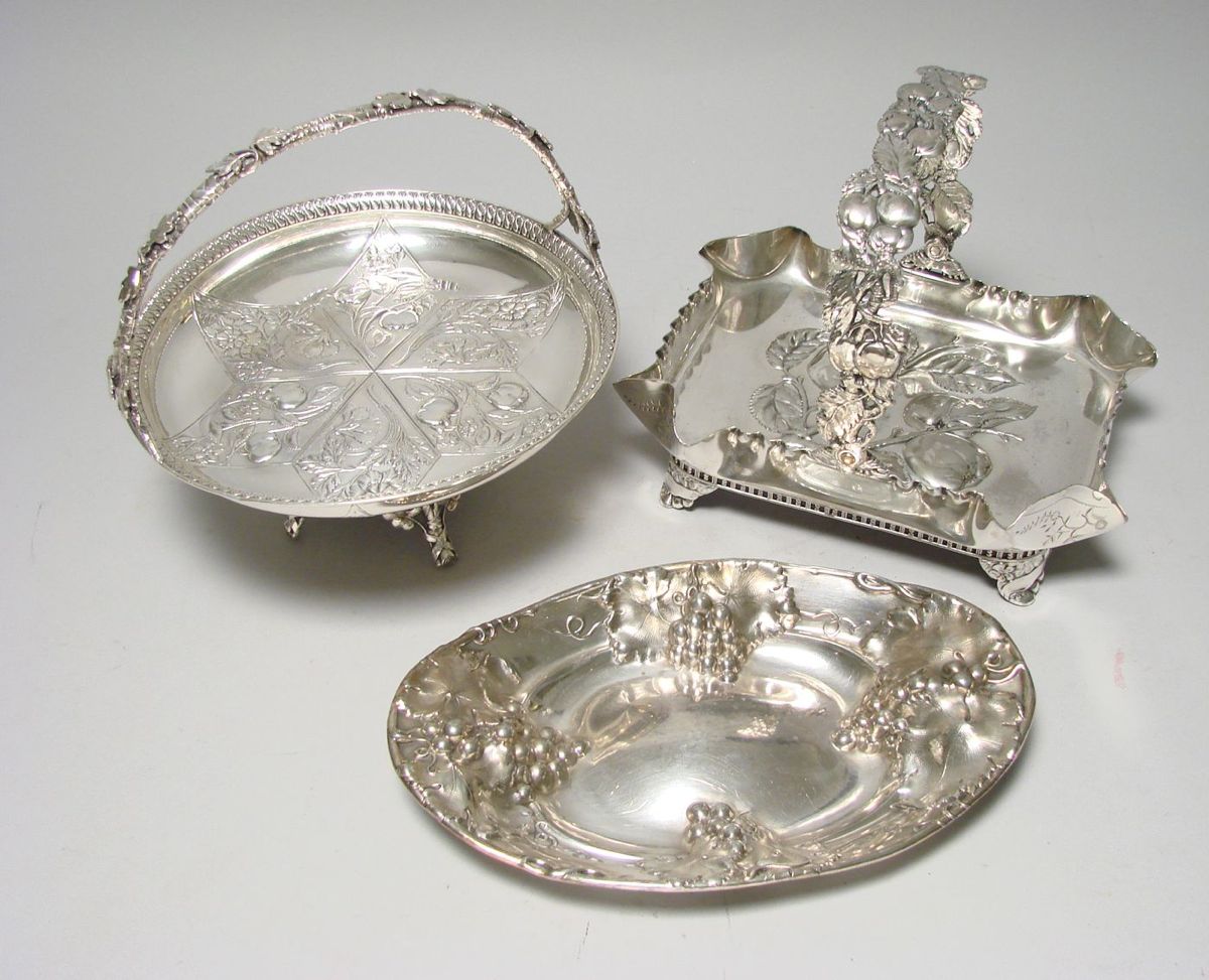 Appraisal: TWO PAIRPOINT SILVER PLATED CAKE BASKETS Circular basket with central