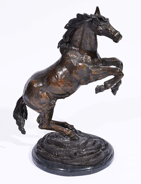 Appraisal: CASTANOA large modern bronze model of a prancing horse on