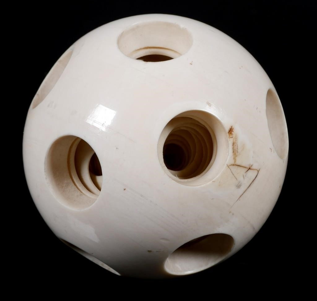 Appraisal: Chinese carved ivory mystery puzzle ball with layers or nested