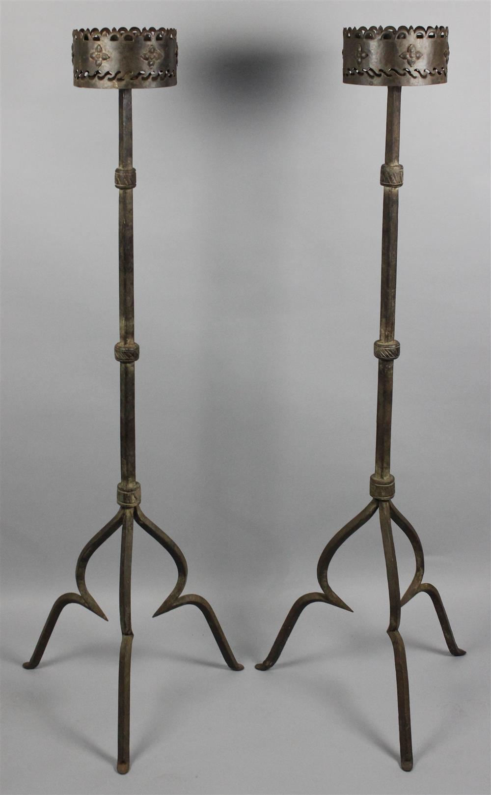 Appraisal: PAIR OF FLOOR STANDING IRON-WORK CANDLE TORCHIERES each having a