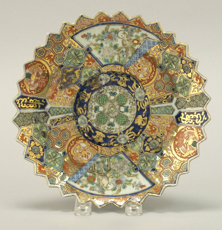 Appraisal: IMARI PORCELAIN PLATE Meiji PeriodWith paneled polychrome decoration Signed Diameter