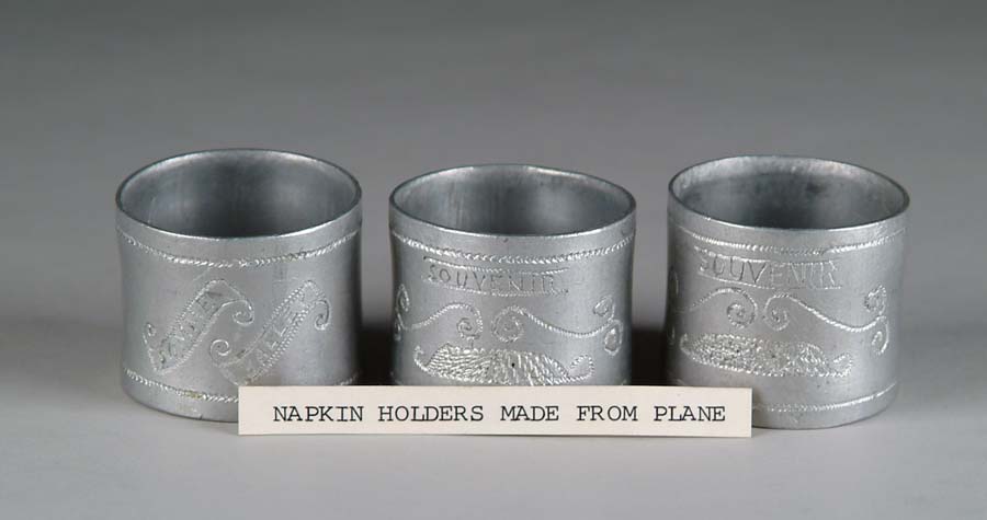 Appraisal: THREE NAPKIN RINGS MADE FROM THE FUEL INTAKE PIPES TAKEN