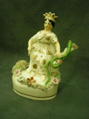 Appraisal: Staffordshire Queen of the Serpents figurine probably pre-Victorian with applied