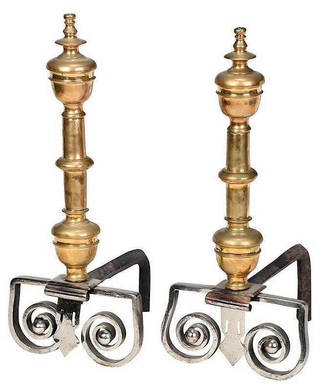 Appraisal: Pair of Brass and Silvered Iron Andirons Continental baluster shaft