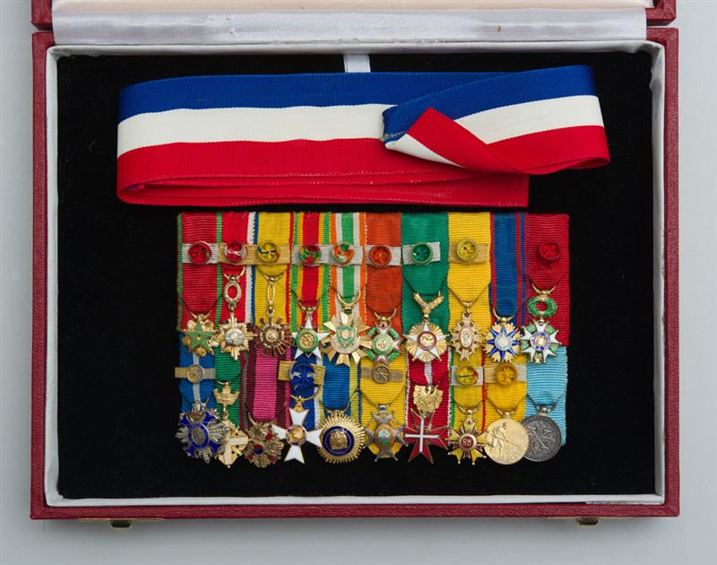 Appraisal: GROUP OF TWENTY DIPLOMATIC SMALL RIBBONED BADGES MOUNTED TOGETHER AND