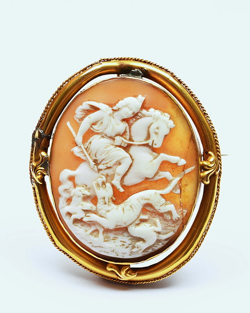 Appraisal: Victorian cameoof oval form showing a figure on horseback slaying