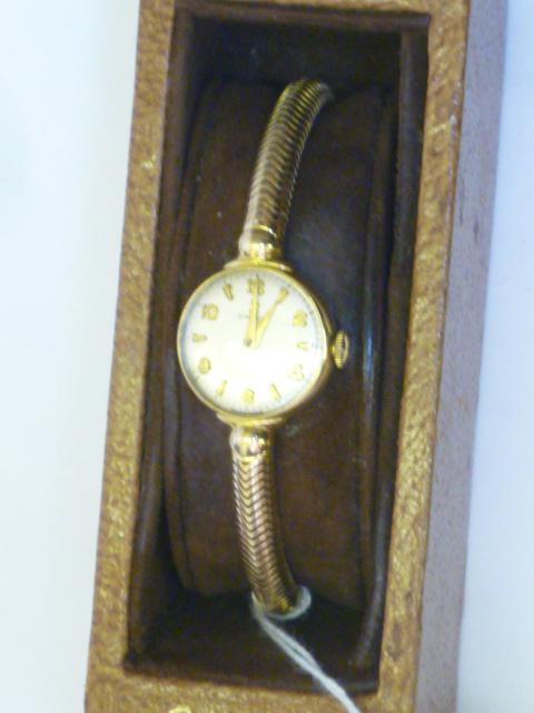 Appraisal: A LADY'S OMEGA CT GOLD WATCH the circular silvered dial