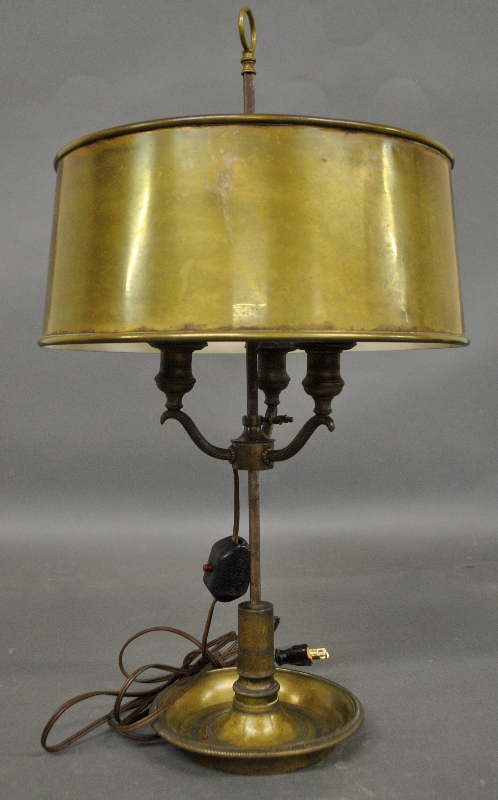 Appraisal: - Early brass adjustable bouillotte lamp with a brass shade