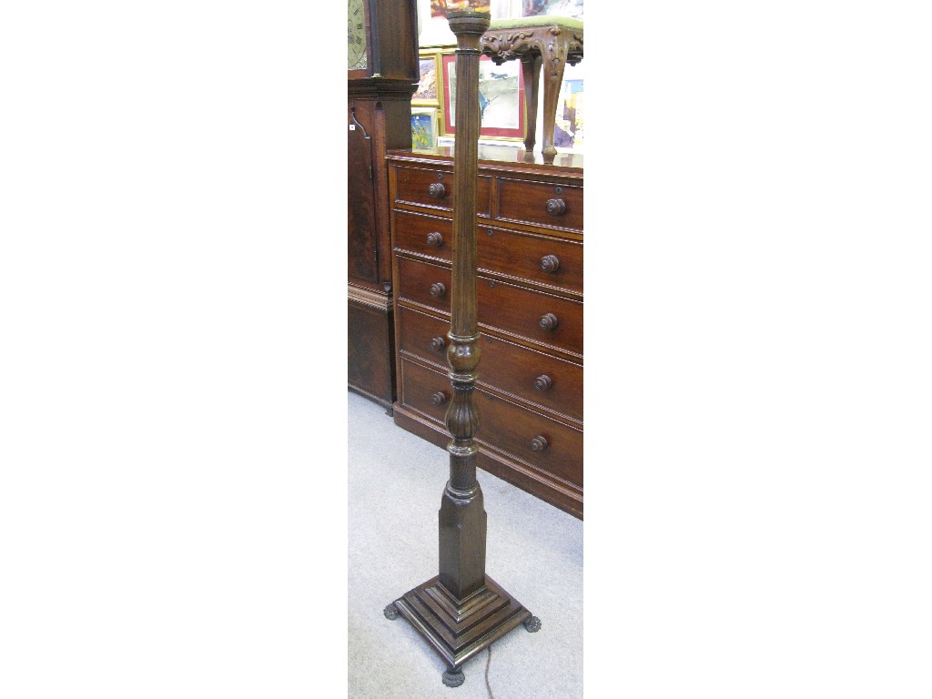 Appraisal: Mahogany floor lamp with reeded column with square base on