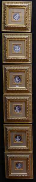 Appraisal: A SET OF DECORATIVE PRINTS OF CHERUBS IN ORNATE GILT