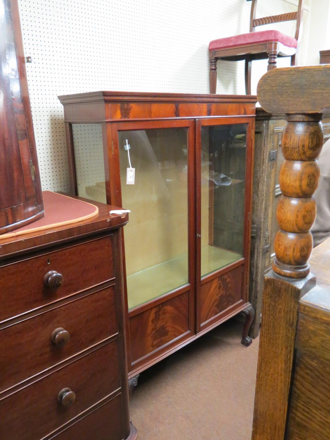 Appraisal: An early th century mahogany display cabinet lined interior with