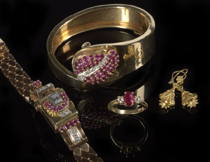 Appraisal: Dramatic Fourteen-Karat Yellow Gold Ruby and Diamond Retro Moderne Cuff