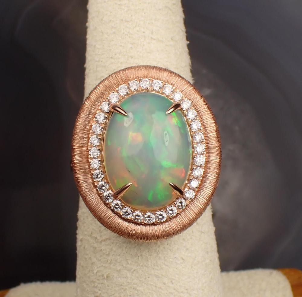 Appraisal: OPAL DIAMOND AND FOURTEEN KARAT GOLD RING The rose gold