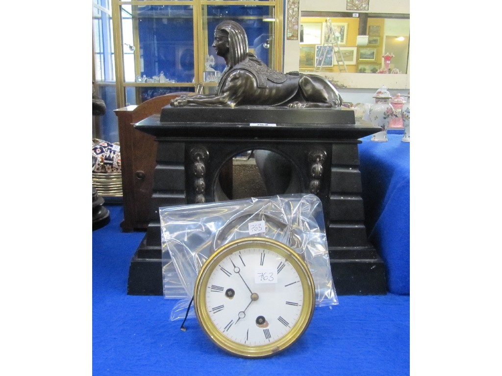 Appraisal: Egyptian revival black slate mantle clock surmounted with a bronzed