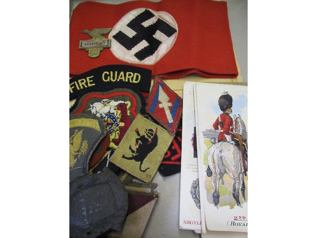 Appraisal: Lot comprising German armband badge assorted patches and postcards