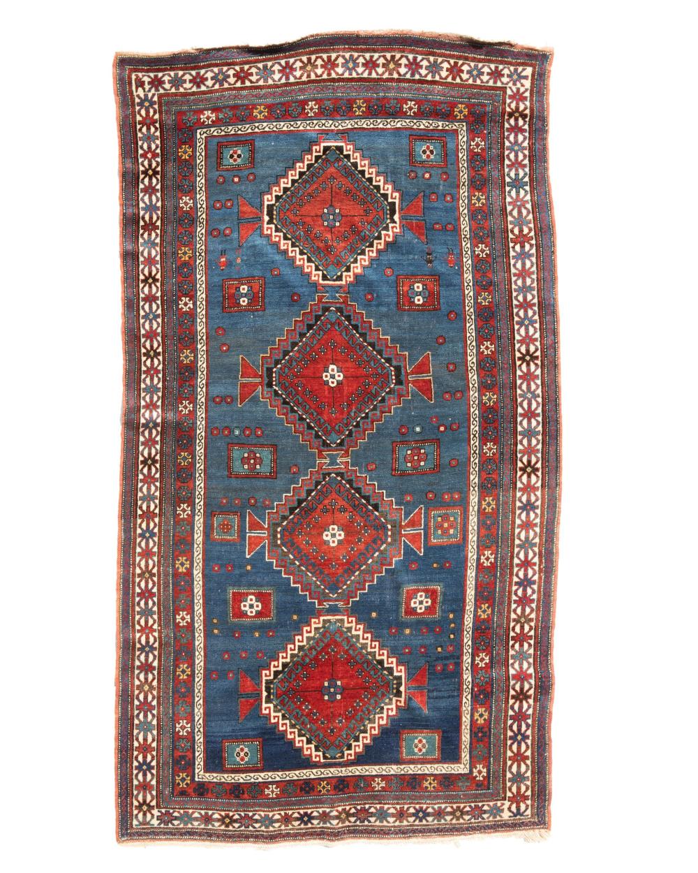 Appraisal: A Caucasian area rug First-Quarter th Century Wool on wool