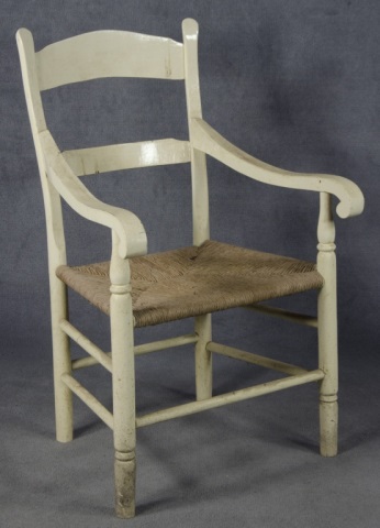 Appraisal: Painted Slat-Back Arm Chair th century Having woven rush seat