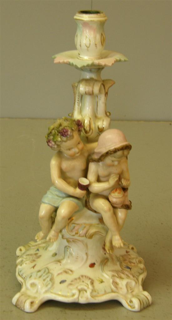 Appraisal: Early twentieth century Dresden candlestick with cherubs to base h