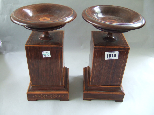 Appraisal: A pair of Charles X rosewood urns circa on boxwood