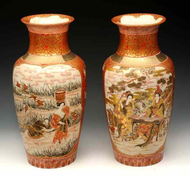 Appraisal: A PAIR OF JAPANESE KUTANI BALUSTER VASES each panel decorated