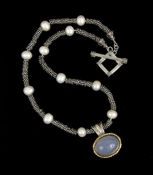 Appraisal: A Sterling Silver and k Gold Chalcedony Pendant and Chain