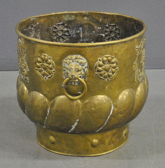 Appraisal: - Large continental brass bucket th c with applied lion