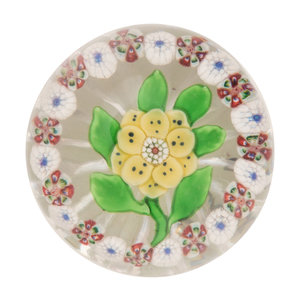 Appraisal: A Baccarat Spotted Yellow Wheatflower and Millefiori Garland Glass Paperweight