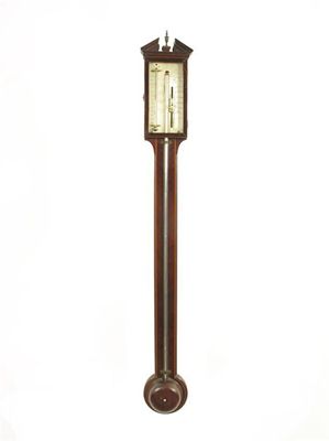 Appraisal: A early th century mahogany stick barometer with a silvered