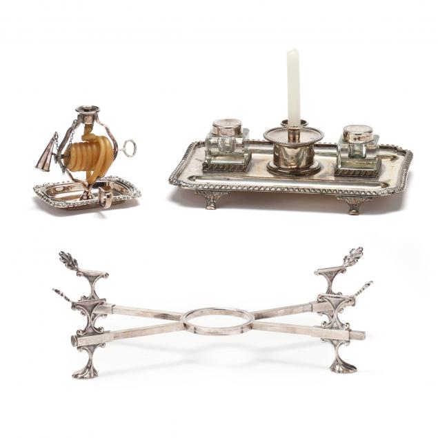 Appraisal: THREE GEORGIAN STYLE ENGLISH SILVERPLATE TABLE ACCESSORIES The first an