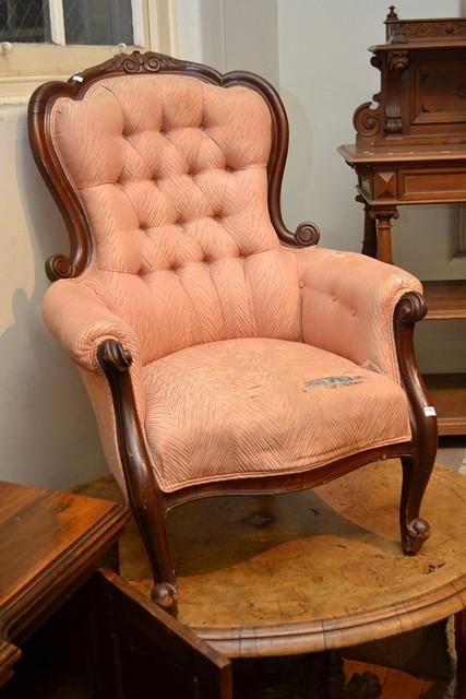 Appraisal: A VICTORIAN GENTLEMAN'S CHAIR IN BUTTON BACKED UPHOLSTERY