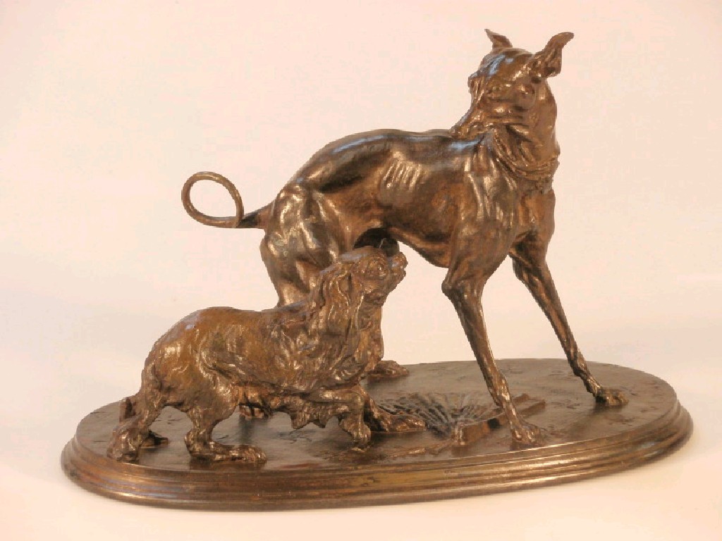 Appraisal: After Pierre Jules Mene A bronzed canine group of a