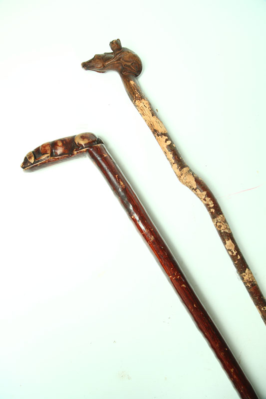 Appraisal: TWO FOLK ART CANES American late th-early th century One