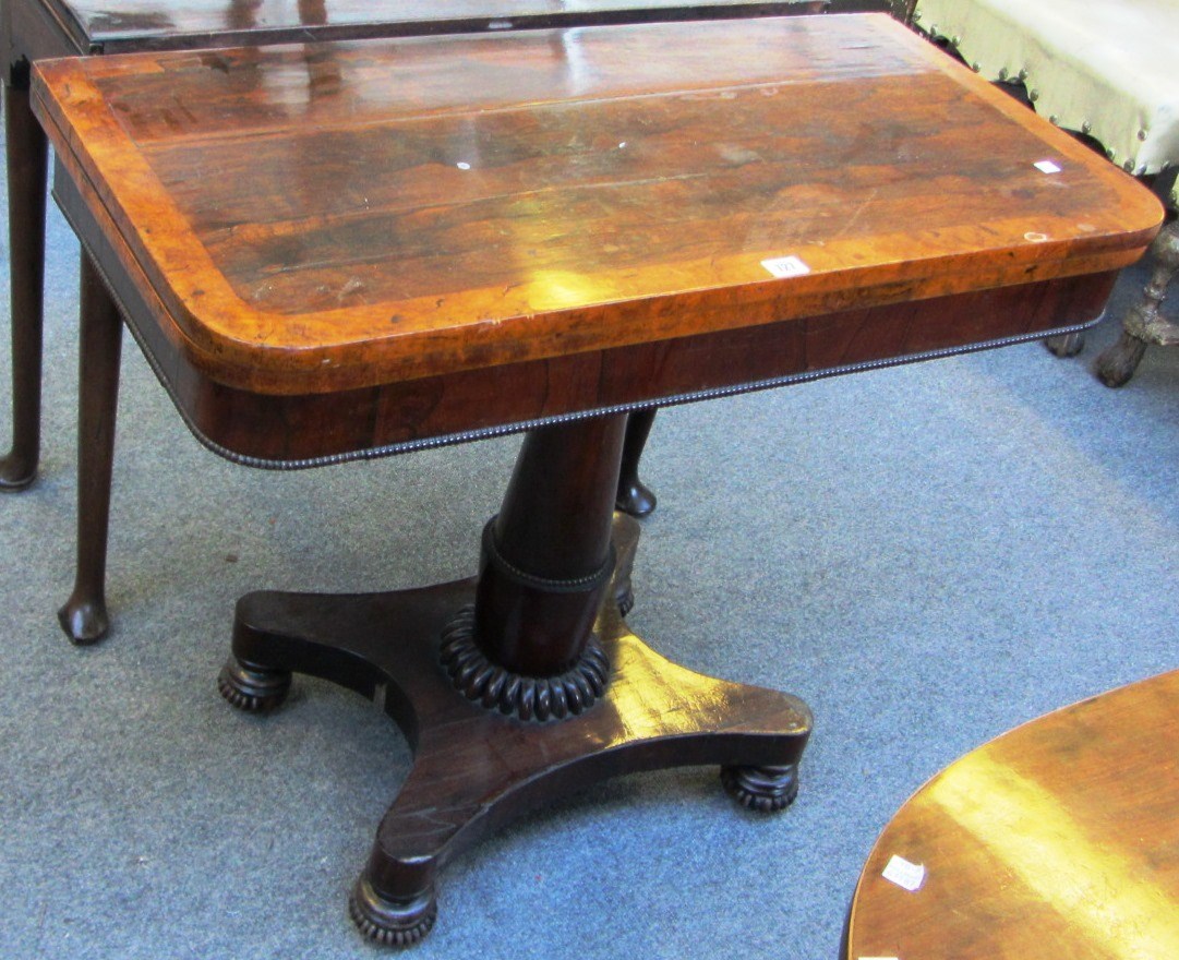 Appraisal: A William IV walnut banded rosewood card table on turned