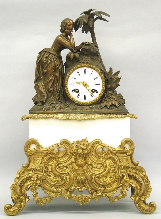 Appraisal: French gilded and bronzed spelter two train mantel clock the