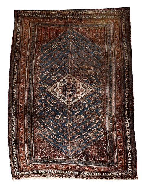 Appraisal: AN ANTIQUE PERSIAN BLUE GROUND RUG with a central diamond